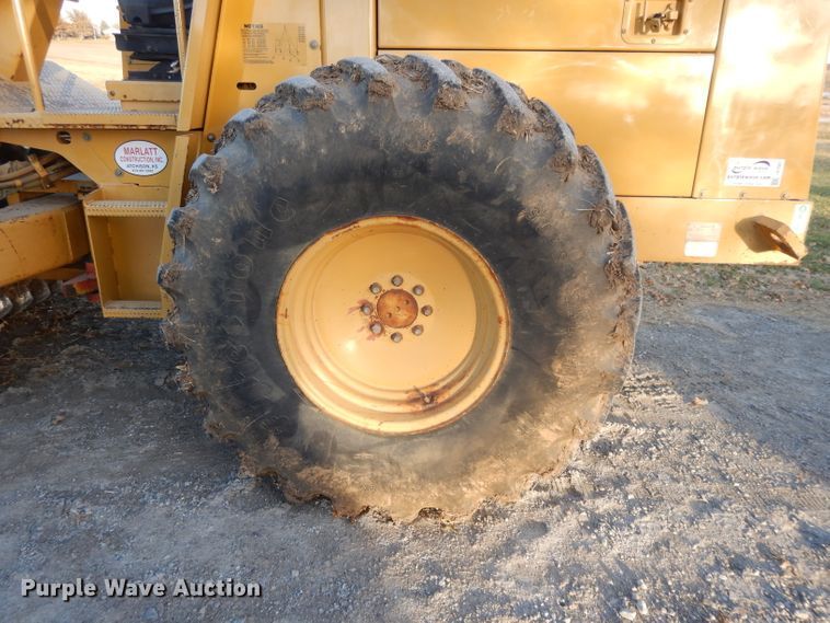 image for item DE2527 1996 Caterpillar CP-563C  vibratory single drum roller