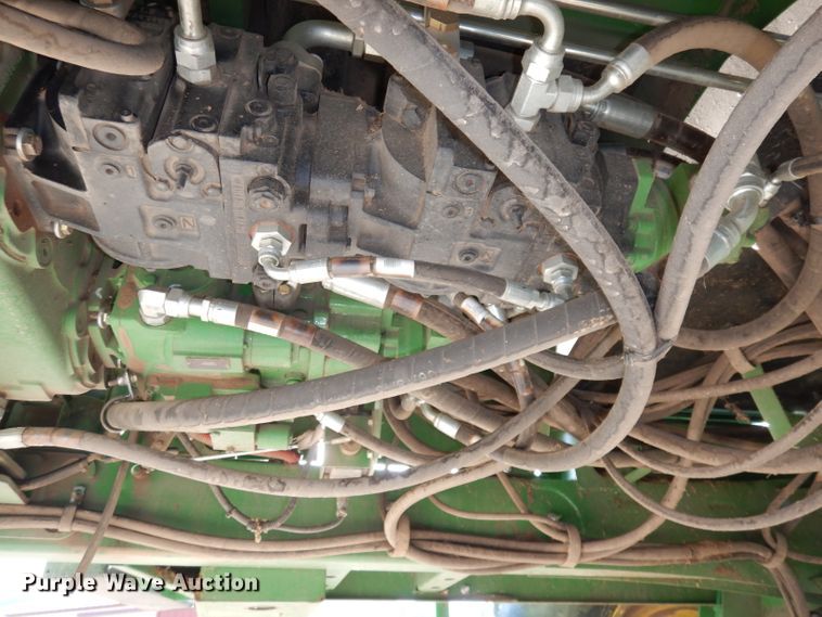 image for item DE2569 2013 John Deere R450  windrower