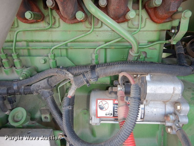 image for item DE2569 2013 John Deere R450  windrower