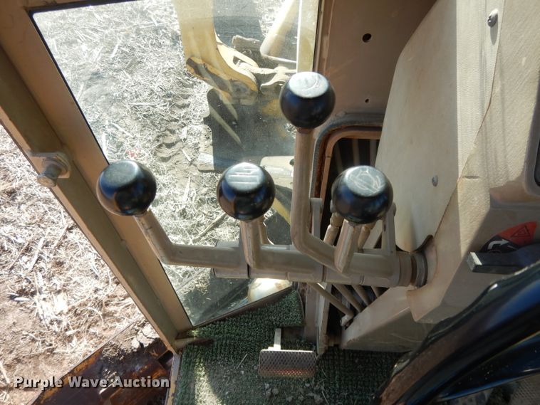 image for item DI8213 1997 John Deere 770B  motor grader