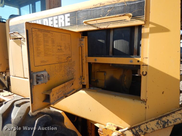 image for item DI8213 1997 John Deere 770B  motor grader