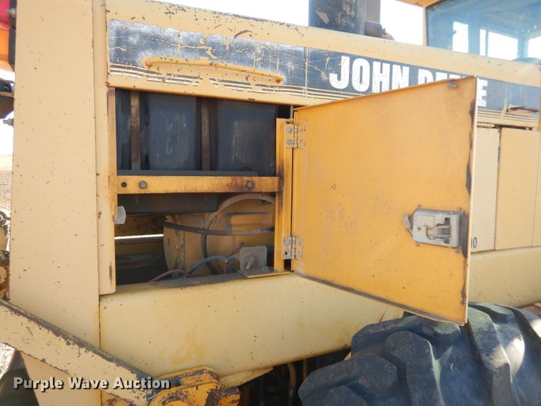 image for item DI8213 1997 John Deere 770B  motor grader