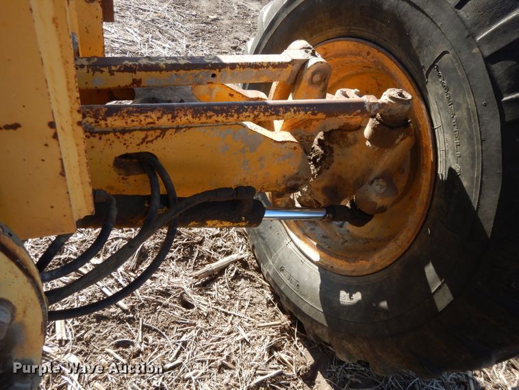 image for item DI8213 1997 John Deere 770B  motor grader