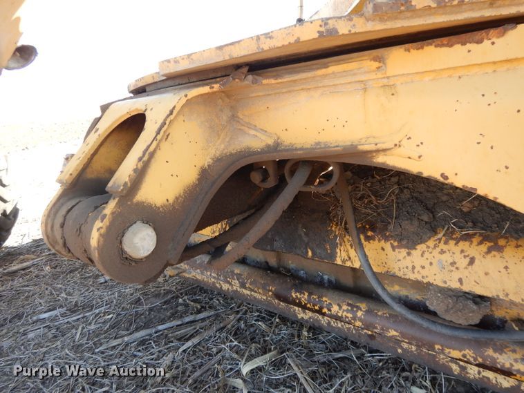 image for item DI8213 1997 John Deere 770B  motor grader