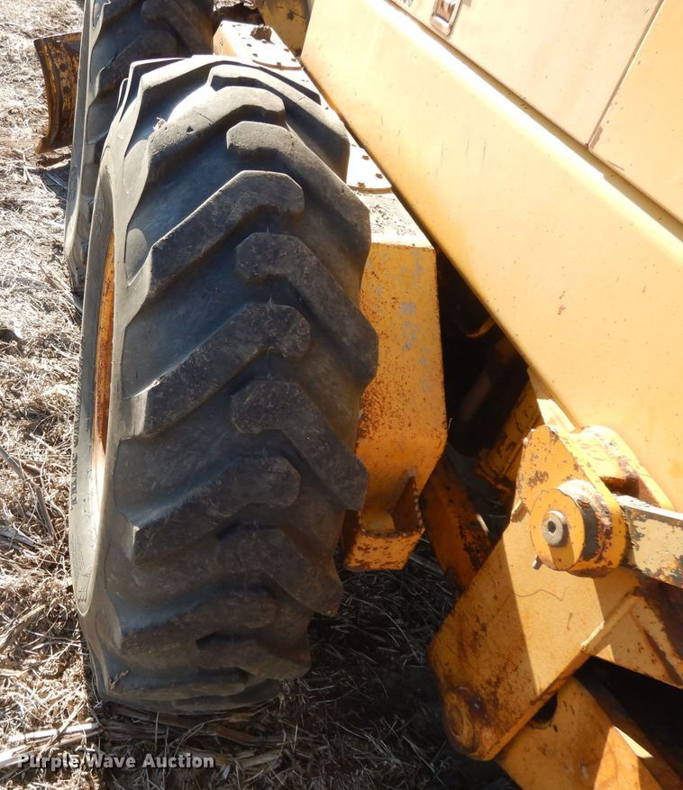 image for item DI8213 1997 John Deere 770B  motor grader