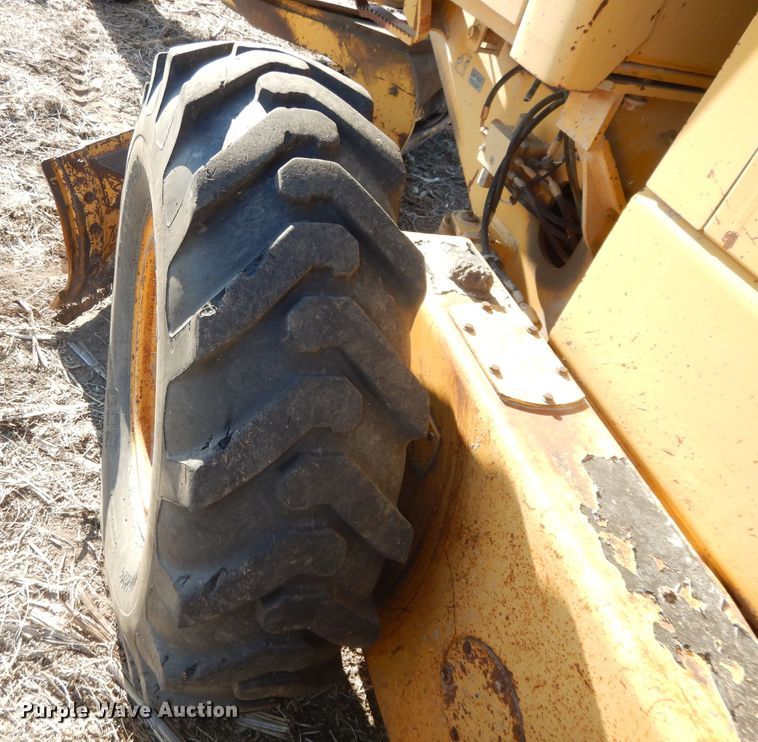 image for item DI8213 1997 John Deere 770B  motor grader