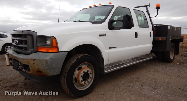 image for item DJ5777 2001 Ford F550 Super Duty XL  Crew Cab flatbed pickup truck