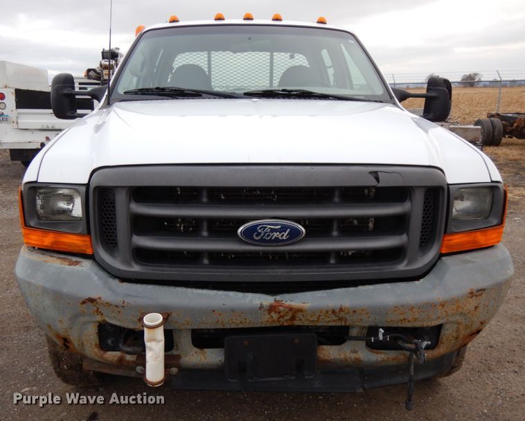 image for item DJ5777 2001 Ford F550 Super Duty XL  Crew Cab flatbed pickup truck