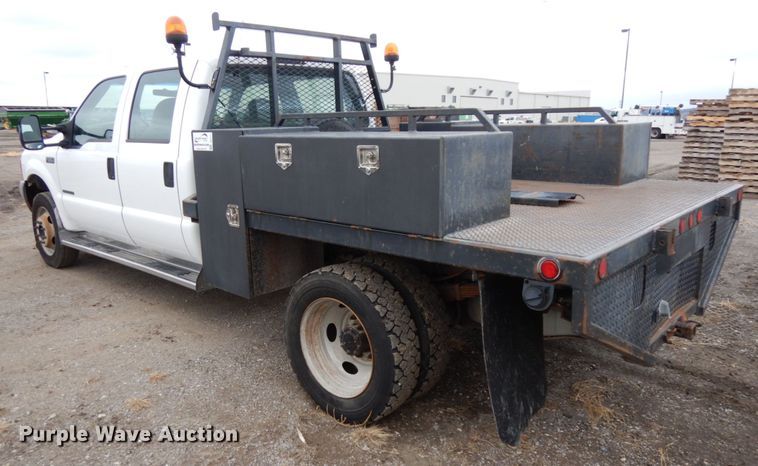 image for item DJ5777 2001 Ford F550 Super Duty XL  Crew Cab flatbed pickup truck