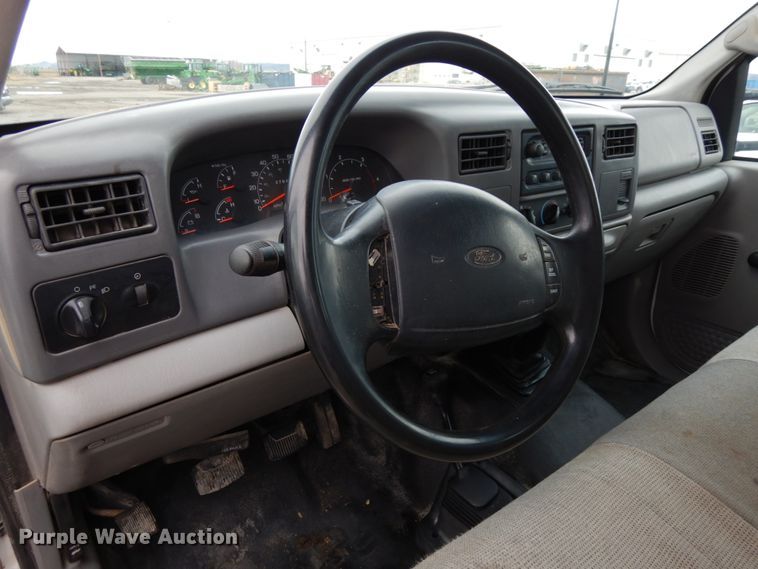 image for item DJ5777 2001 Ford F550 Super Duty XL  Crew Cab flatbed pickup truck