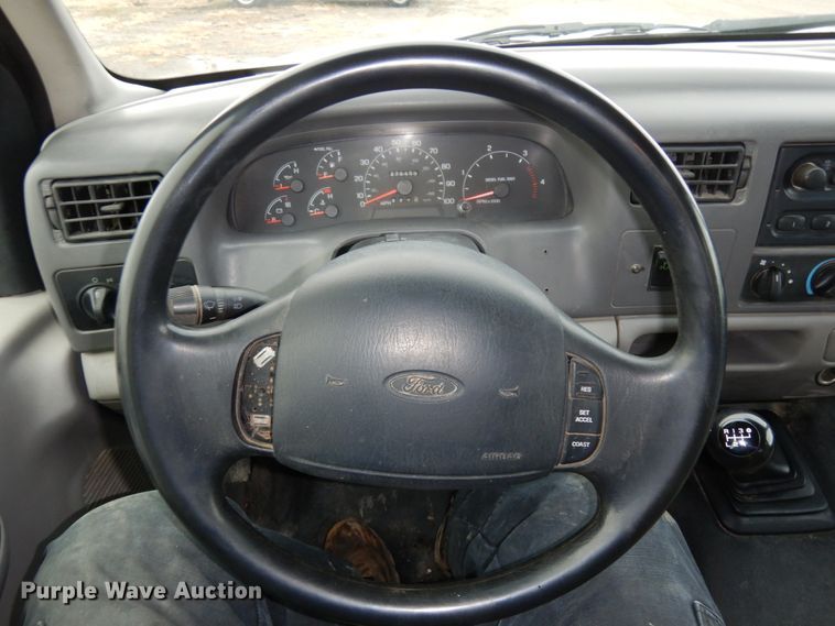 image for item DJ5777 2001 Ford F550 Super Duty XL  Crew Cab flatbed pickup truck