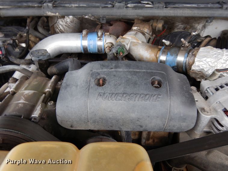 image for item DJ5777 2001 Ford F550 Super Duty XL  Crew Cab flatbed pickup truck