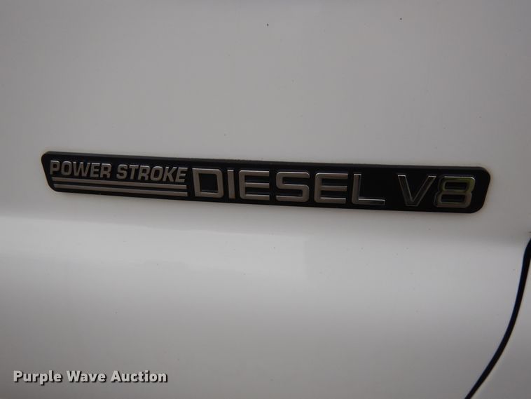 image for item DJ5777 2001 Ford F550 Super Duty XL  Crew Cab flatbed pickup truck