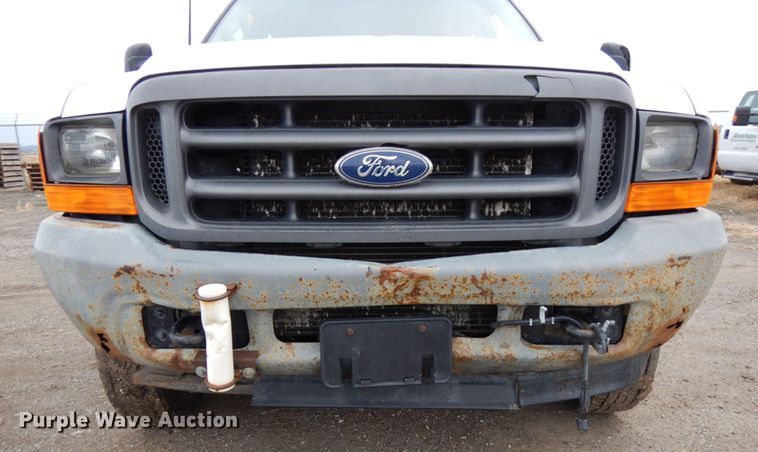 image for item DJ5777 2001 Ford F550 Super Duty XL  Crew Cab flatbed pickup truck