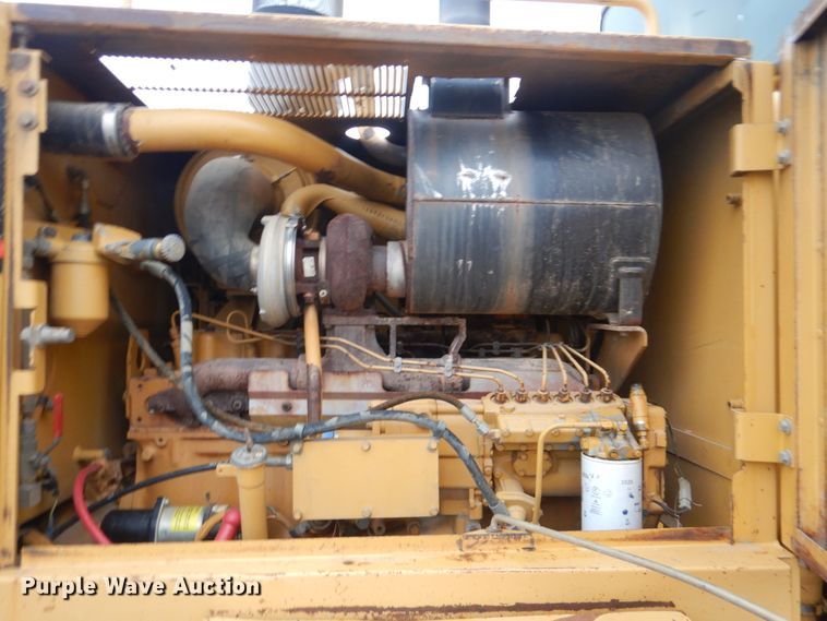 image for item DJ8544 1999 Caterpillar 12H  motor grader