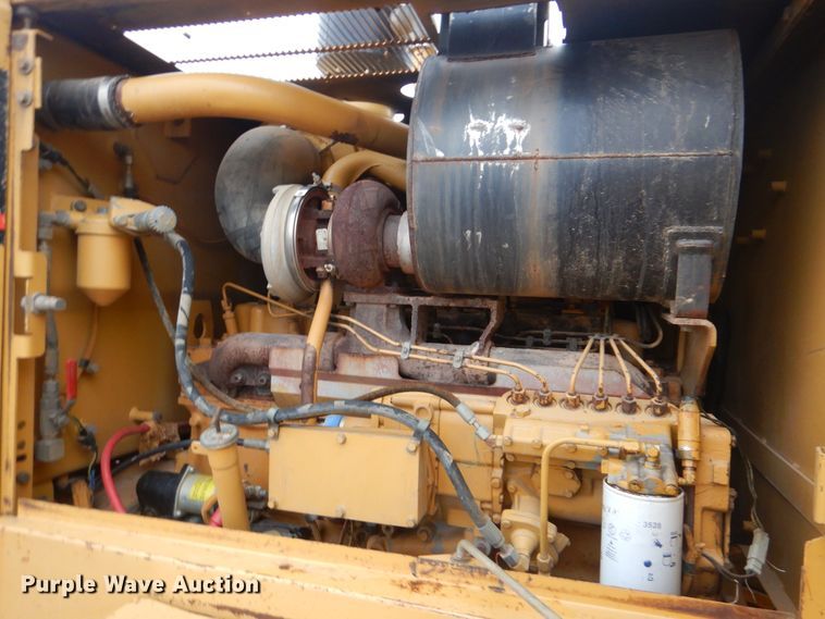 image for item DJ8544 1999 Caterpillar 12H  motor grader