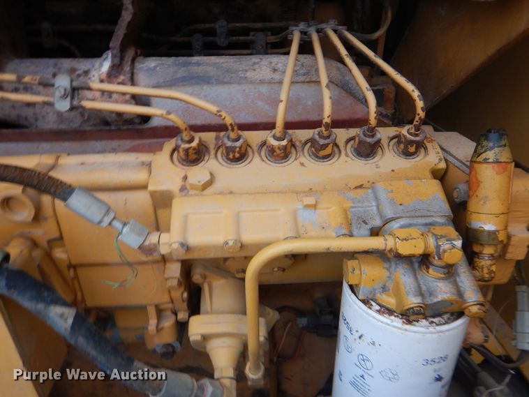 image for item DJ8544 1999 Caterpillar 12H  motor grader