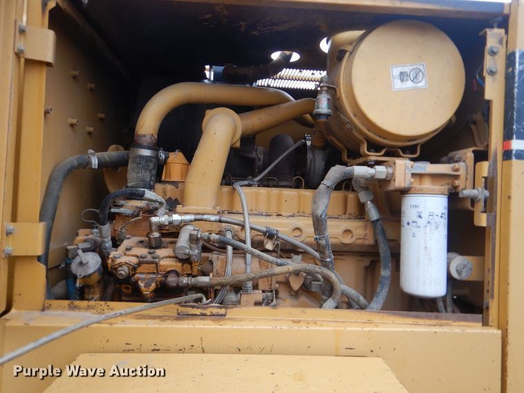 image for item DJ8544 1999 Caterpillar 12H  motor grader