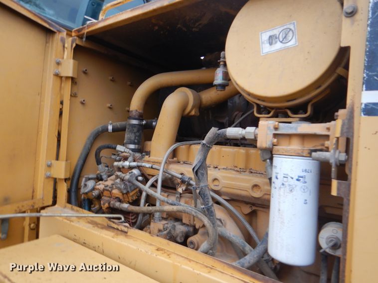 image for item DJ8544 1999 Caterpillar 12H  motor grader
