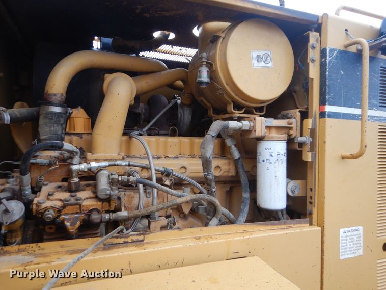 image for item DJ8544 1999 Caterpillar 12H  motor grader