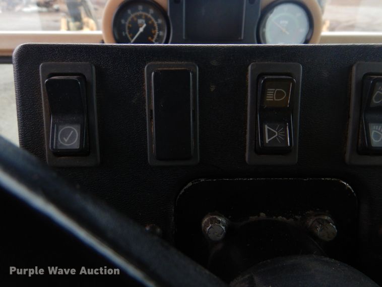 image for item DJ8544 1999 Caterpillar 12H  motor grader