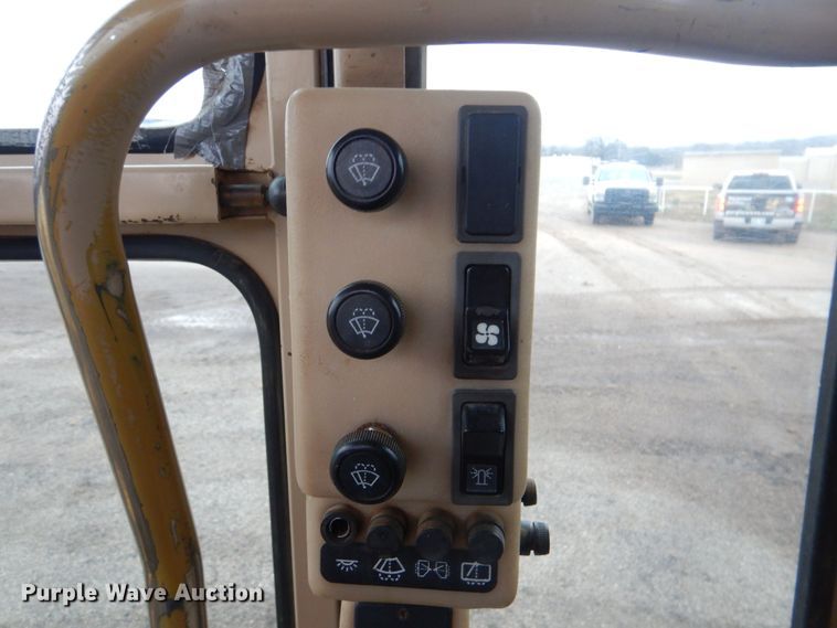 image for item DJ8544 1999 Caterpillar 12H  motor grader