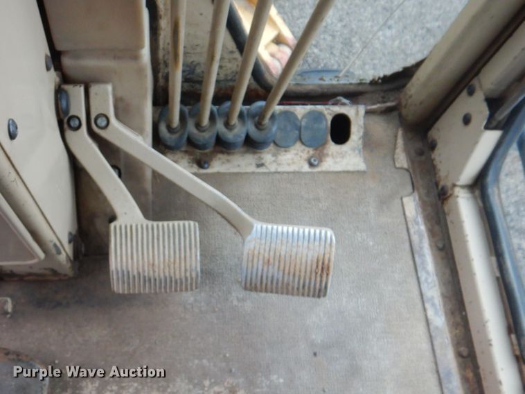 image for item DJ8544 1999 Caterpillar 12H  motor grader