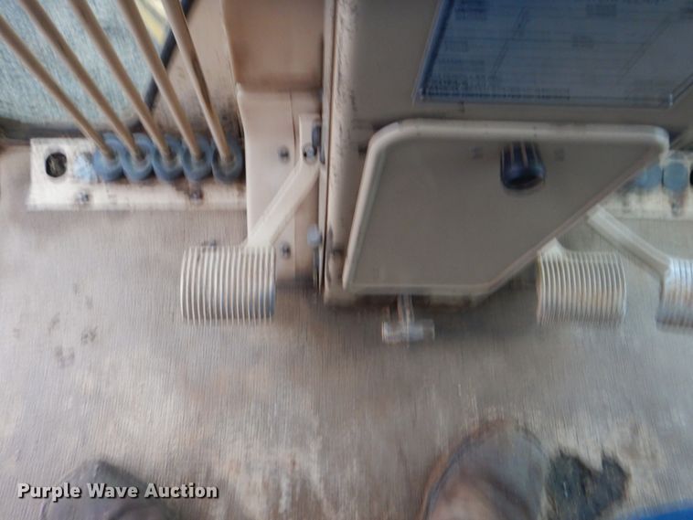 image for item DJ8544 1999 Caterpillar 12H  motor grader