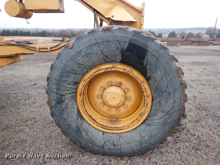 image for item DJ8544 1999 Caterpillar 12H  motor grader