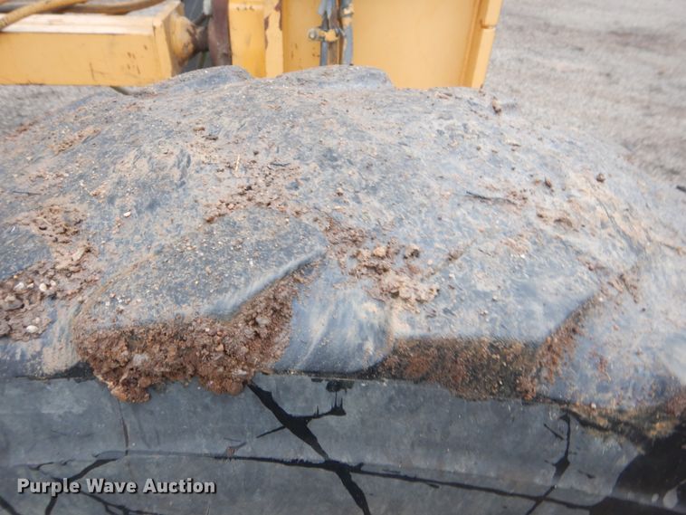 image for item DJ8544 1999 Caterpillar 12H  motor grader