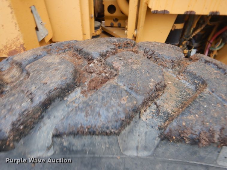 image for item DJ8544 1999 Caterpillar 12H  motor grader