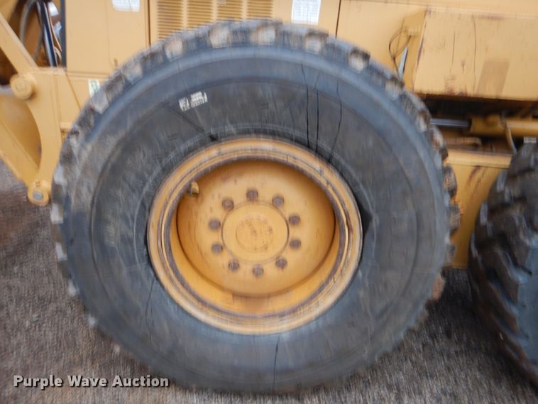 image for item DJ8544 1999 Caterpillar 12H  motor grader