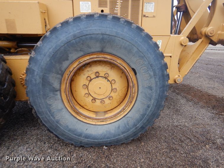 image for item DJ8544 1999 Caterpillar 12H  motor grader