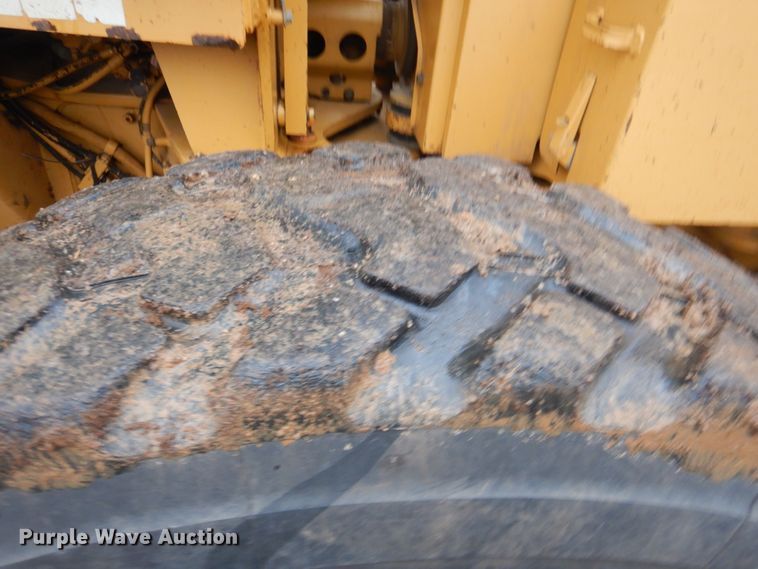 image for item DJ8544 1999 Caterpillar 12H  motor grader