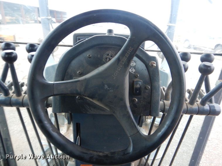 image for item DJ8545 2009 John Deere 770D  motor grader