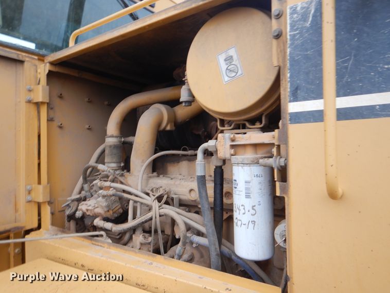 image for item DJ8546 1999 Caterpillar 12H  motor grader