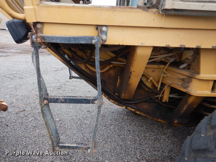 image for item DJ8546 1999 Caterpillar 12H  motor grader
