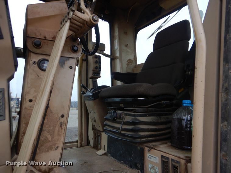 image for item DJ8546 1999 Caterpillar 12H  motor grader