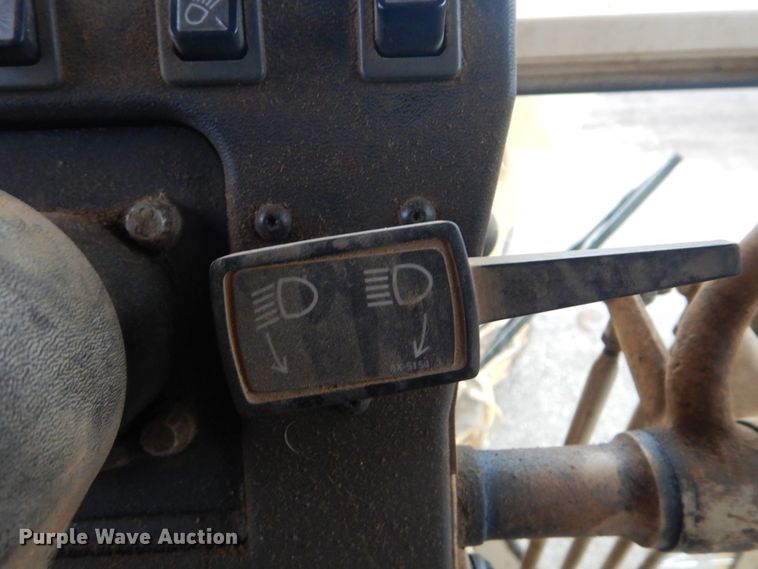 image for item DJ8546 1999 Caterpillar 12H  motor grader