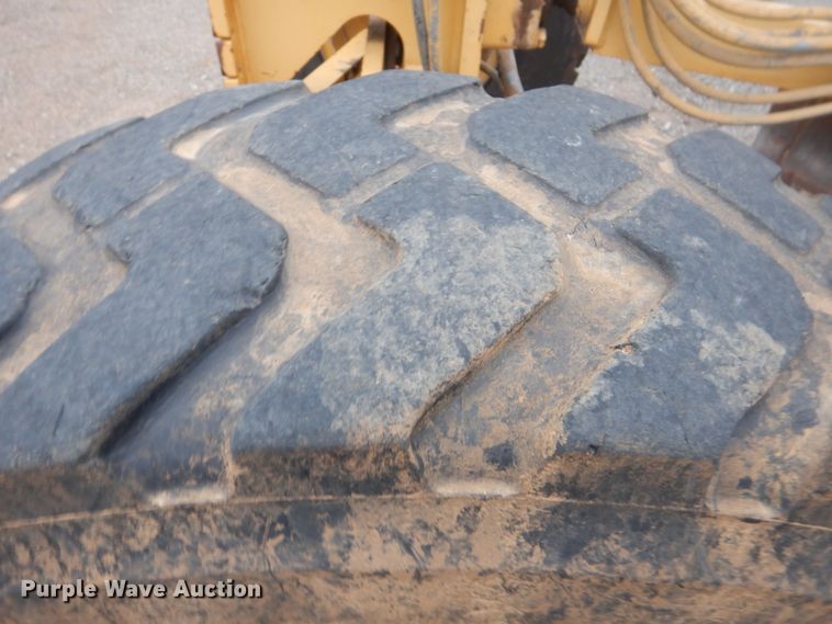 image for item DJ8546 1999 Caterpillar 12H  motor grader