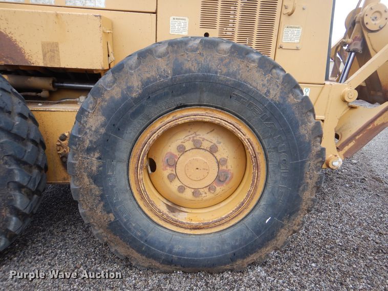 image for item DJ8546 1999 Caterpillar 12H  motor grader