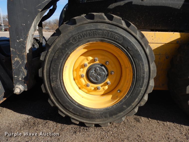 image for item EY9127 2011 New Holland L215  skid steer loader