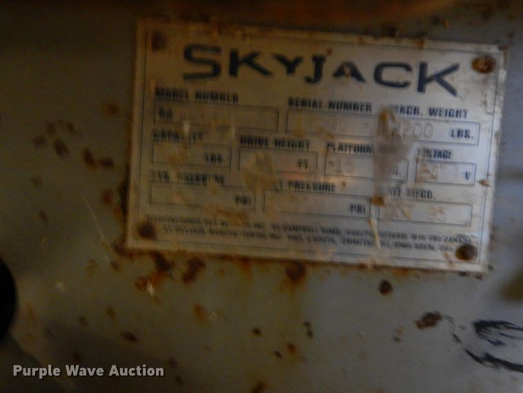 image for item HP9057 Sky Jack SJM3015  scissor lift