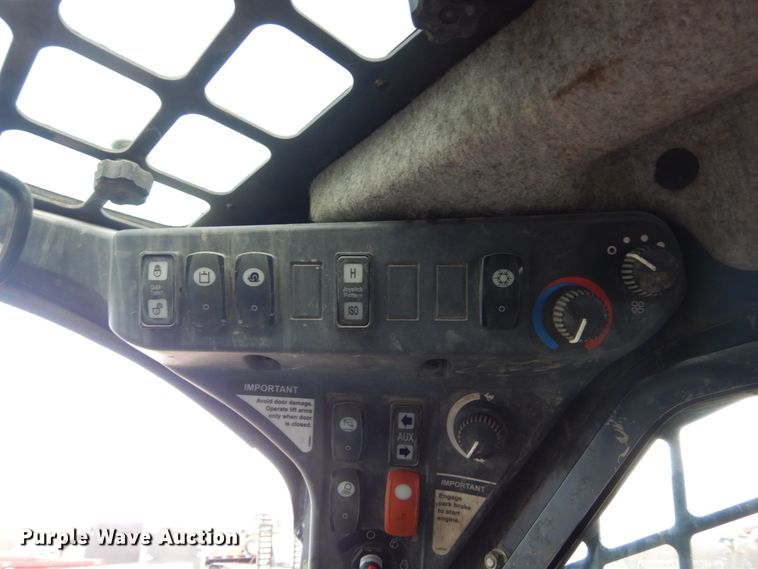 image for item HU9856 2012 John Deere 326D  skid steer loader