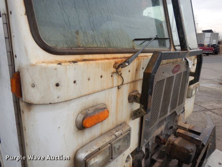 image for item DL2519 2012 Peterbilt PB320  refuse truck