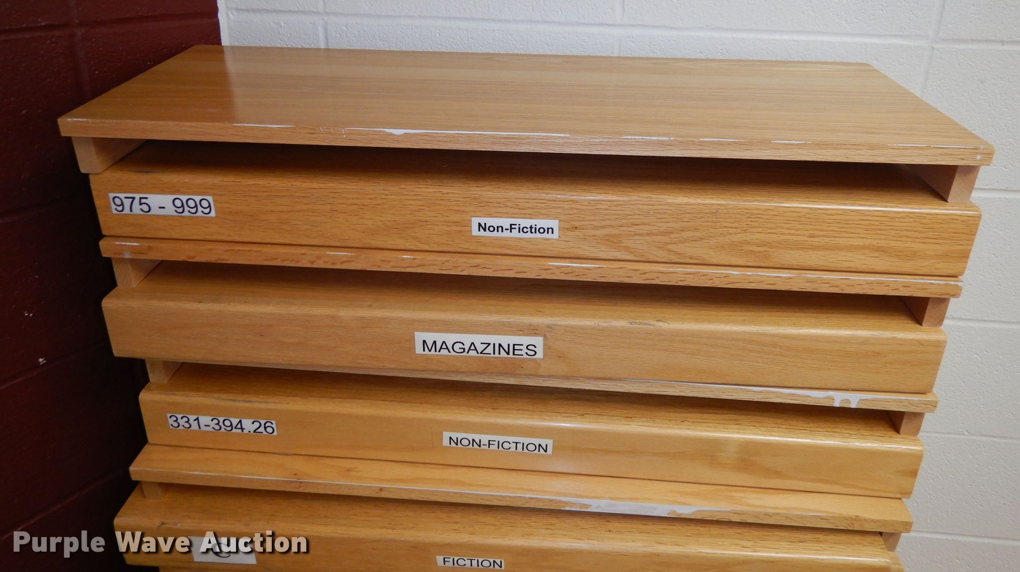 Library shelving in Kansas City, KS Item GJ9734 sold Purple Wave