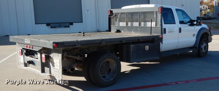 image for item DJ8131 2012 Ford F550 Super Duty  Crew Cab flatbed truck