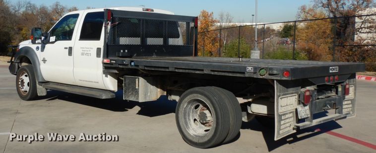 image for item DJ8131 2012 Ford F550 Super Duty  Crew Cab flatbed truck
