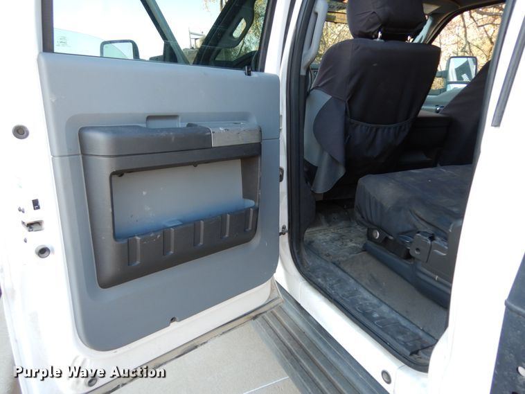 image for item DJ8131 2012 Ford F550 Super Duty  Crew Cab flatbed truck