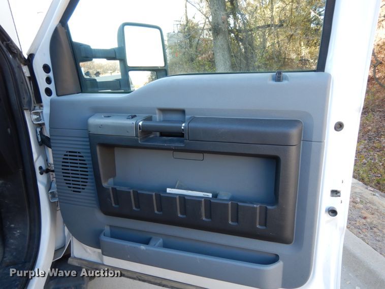 image for item DJ8131 2012 Ford F550 Super Duty  Crew Cab flatbed truck